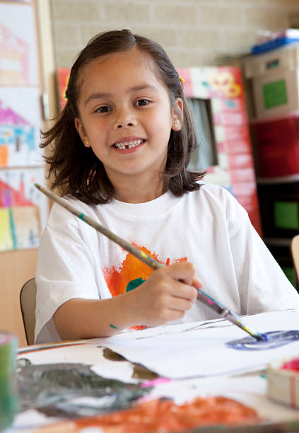 istock Little child painting 173870261