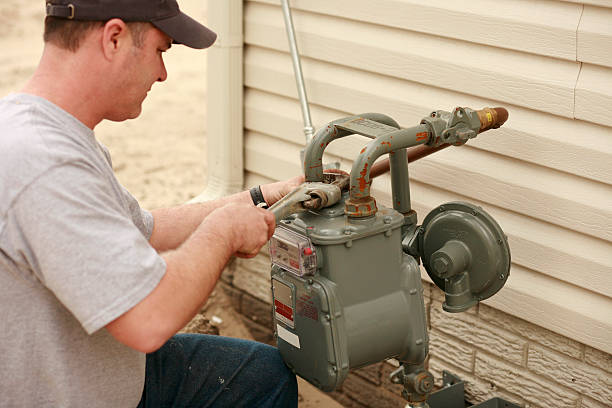 encanador reparar tubulação de água - water meter - fotografias e filmes do acervo