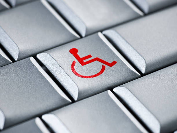 istock Wheelchair on a laptop key 173871239