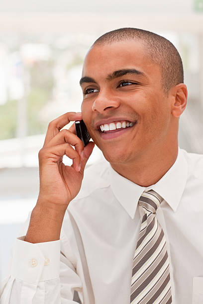 istock Young business man speaking on cellphone 173871826