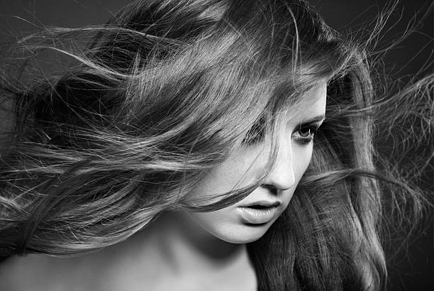 istock woman with flying long hair 173871927