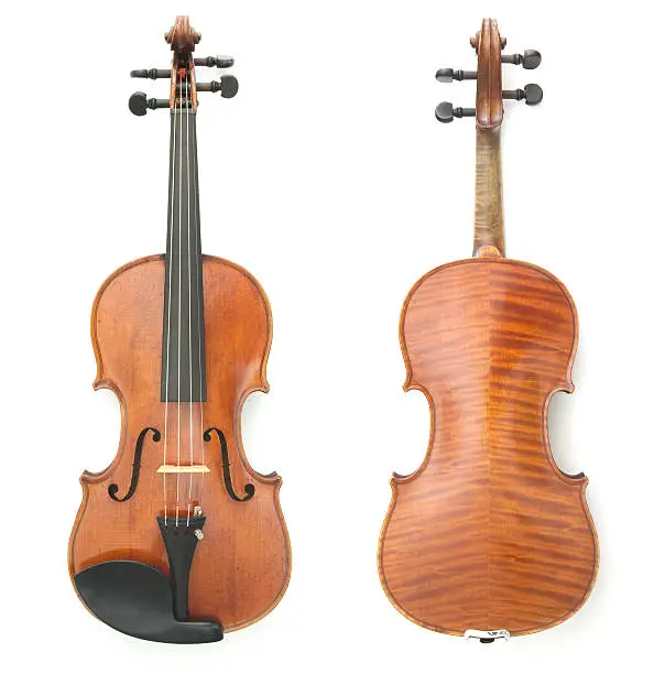 Two full resolution views of the same violin isolated on white background.  Back is flamed tiger maple and the front is spruce.Reflective varnish.Please see some similar pictures from my portfolio: