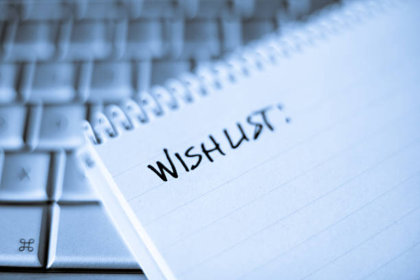 istock Spiral notebook on Laptop with blank Wishlist 173872898