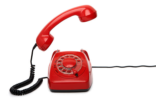 istock Red telephone with receiver off the hook 173872901