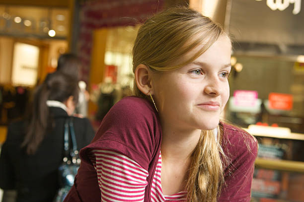 istock Smiling Girl Shopping 173874474