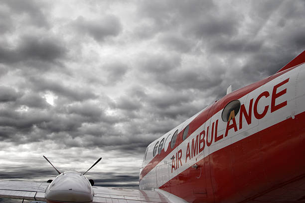 Air ambulance airplane on overcast cloudy day stock photo