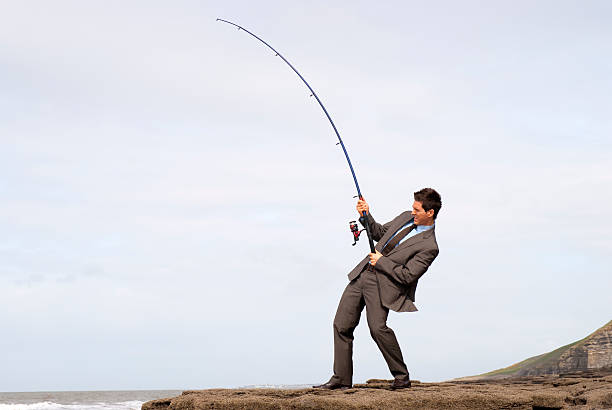 830+ Business Man With Fishing Rod Stock Photos, Pictures & Royalty-Free  Images - iStock
