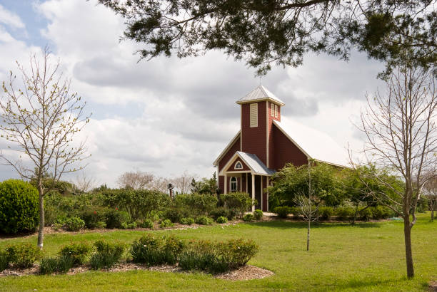 tree-framed country church near Seymour, Texas, puffy clouds, blue sky