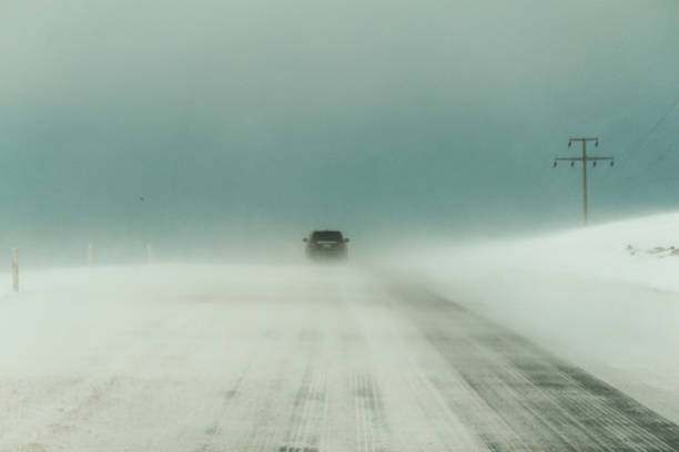 istock Snow-covered long road, rural area, asphalt road 1738762247