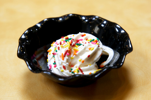 Vanilla ice cream with coloured sprinkles