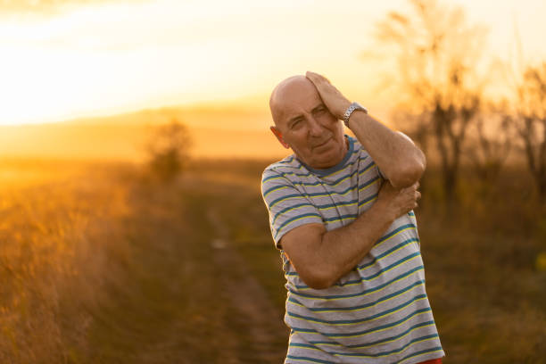 istock Senior Man Stretching Outdoors 1738770008