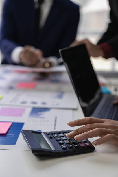 istock Vertical images, charts and income graphs using a laptop computer. Business analysis and strategy concepts Meet with a business advisor and discuss finances, close-up photo 1738775908