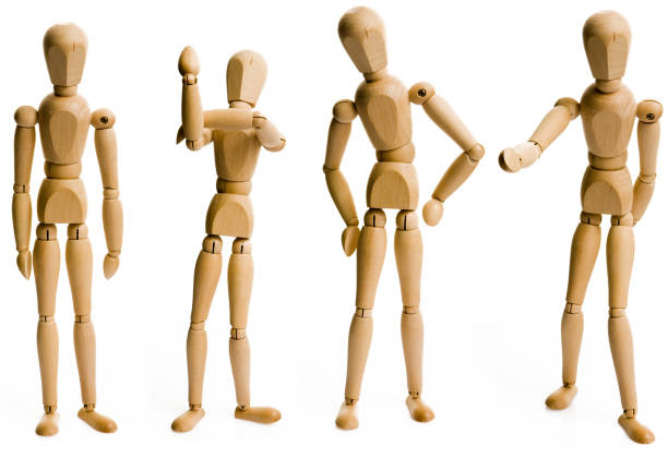 istock wooden human like dolls 173877741