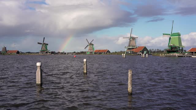 Traditional dutch windmills along the Zaan river in Zaanse Schans