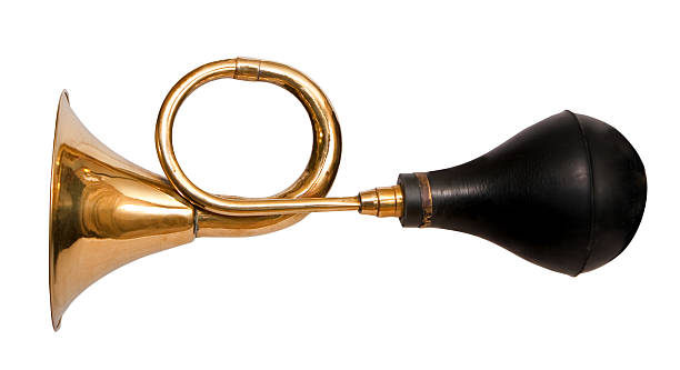 an old brass squeeze type horn that was used on old taxis. Not sure of the the era