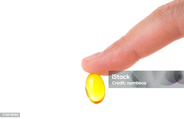 Foto de Pill e mais fotos de stock de Comprimido - Comprimido, Cápsula, Dedo humano