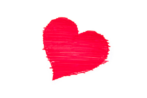 Sketch of heart was drawn by red colored pencil, on white paper