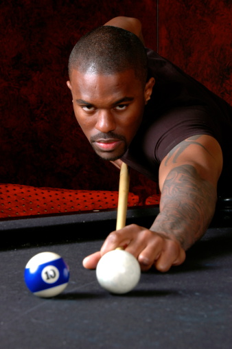 African American man looking intensely at the camera straight down the cue stick. Taken at the SLC Lypse 2009. Click photo below to see more of this model.