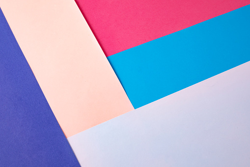 Sheets of colored papers for abstract geometric background