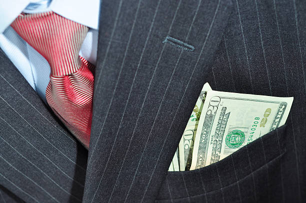 istock Money in a business suit pocket. 173880684