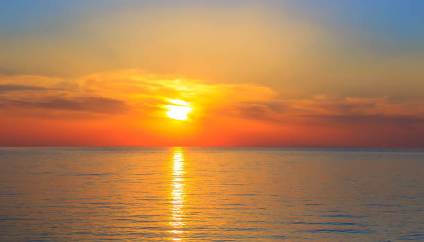 istock Sunset over the sea in summer 1738808449