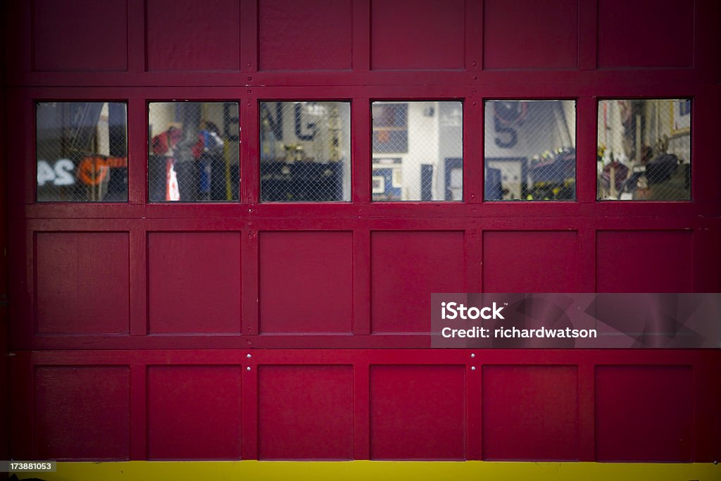 Fire Department New York - bright red station door "Red garage door of fire station in Manhattan, New York. Taken with Canon 1Ds MarkIII. Perfect for backdrop" Fire Station Stock Photo