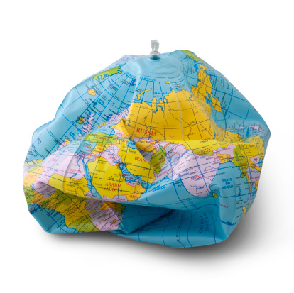 Globe deflates. Photo with clipping path. Please see some similar pictures from my portfolio: