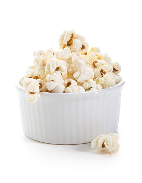 Small serving of organic popcorn A serving of plain organic popcorn - a tasty and healthy snack with a nice amount of fiber. popcorn snack bowl isolated stock pictures, royalty-free photos & images