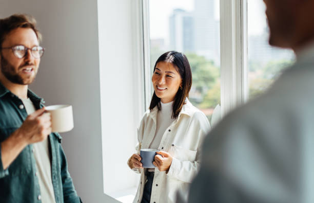 istock Business people having a chat during a coffee break in an office 1738823967