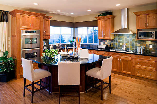 Blurred defocus minimal home kitchen with wooden counter.