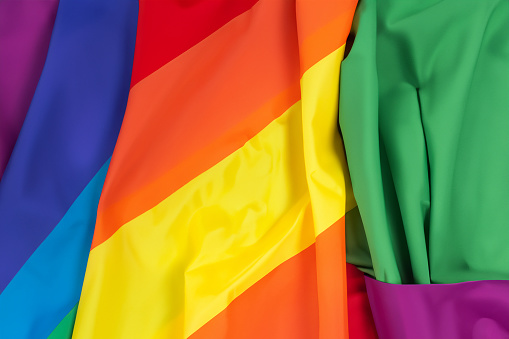 LGBTQIA community flag background. Colorful beautiful background. World Pride Day celebration