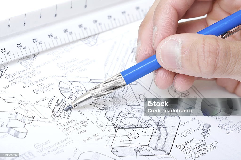 drafting blue print hand pointing out a spring Engineer Stock Photo