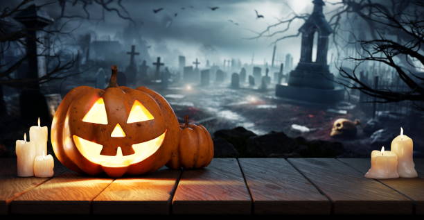 istock Halloween Pumpkin Jack O Lantern On Table In Spooky Graveyard At Night, Full Moon. Graves in the background. 3d render 1738831764