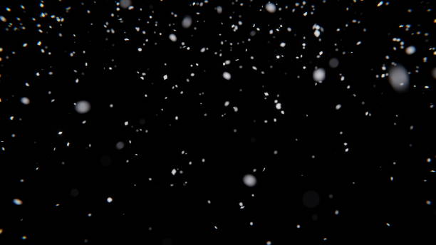 istock White snow falls in the dark on a black background. Blurred snowflakes in motion. 3d render 1738831776