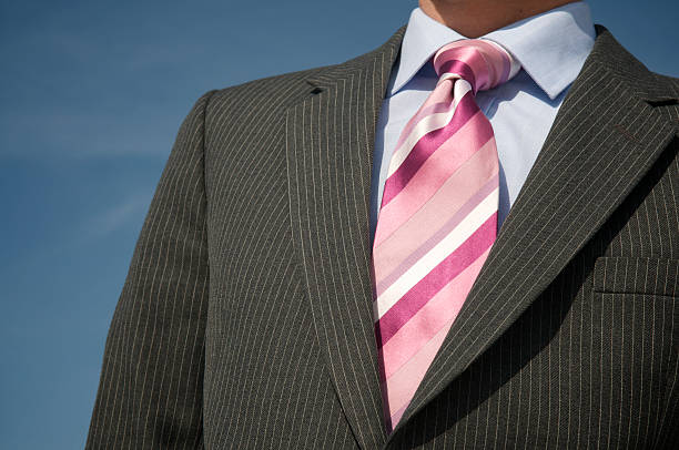 istock Pink Tie Suit Sky Close-Up 173884042