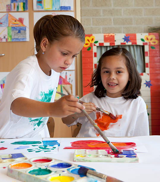 istock Little children painting 173884539