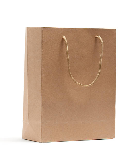 istock Brown paper bag isolated on white. 173885632