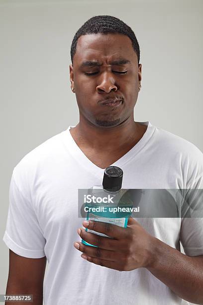 Fluoride Mouthwash Stock Photo - Download Image Now - Mouthwash, Men, African Ethnicity