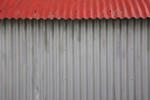 Quonset hut with red roof