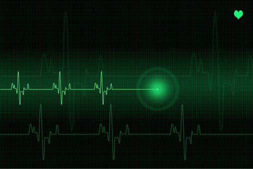 Heart pulse trace on black background