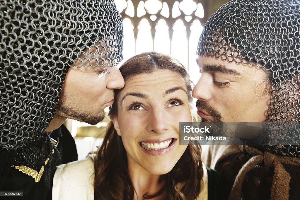 Knights Kissing Princess Close-up of two knights kissing an attractive young woman 20-29 Years Stock Photo