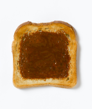 toast isolated with marmite and shadow