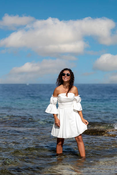Free Stock Photo of Woman Standing in Water Wearing White Dress ...
