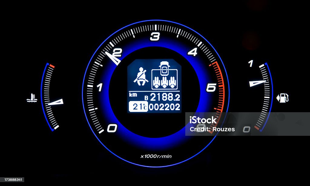 Tachometer Tachometer and fuel gage on black Car Stock Photo