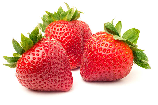 Strawberries Three fresh ripe red strawberries, isolated on white with soft shadow. strawberry stock pictures, royalty-free photos & images