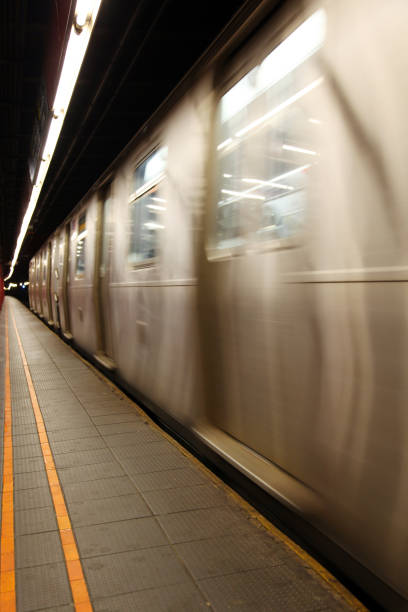 istock Subway Train Arriving/Leaving Platform, New York 173888475