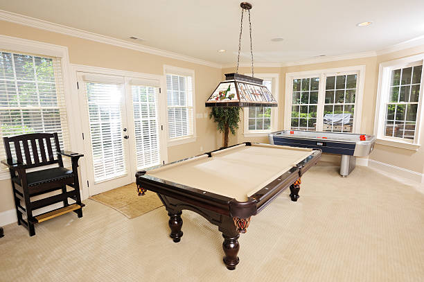 istock Pool Table in Game Room of Luxury Home 173889023