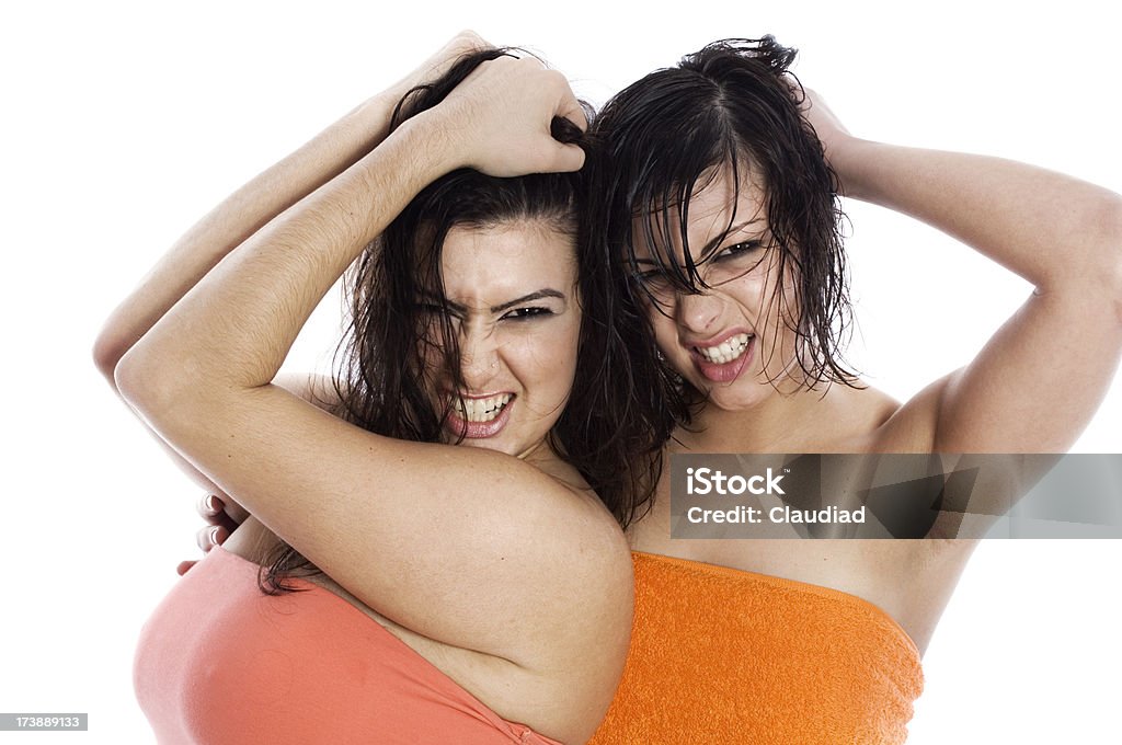 Due ragazze wet and wild - Foto stock royalty-free di 20-24 anni
