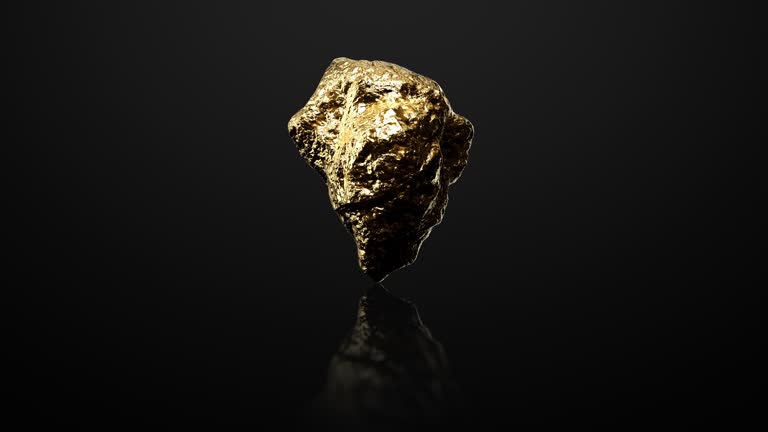 Gold Nugget rotating on black background. Realistic animation of a rotating shiny precious gold nugget.