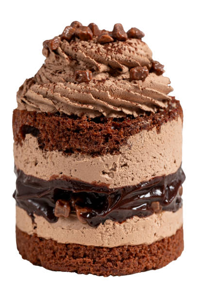 istock Chocolate and cocoa cake. Layer cake with fresh chocolate cream isolated on white background. Close up 1738892926